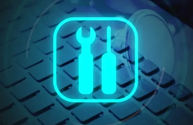 Break/Fix Services Icon of a wrench and screwdriver over a keyboard background.